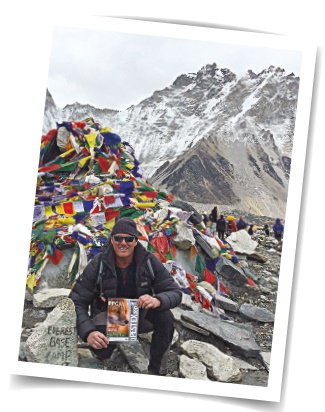 David Lacey at Everest Basecamp with some quality reading matter in case of, y’know, boredom.